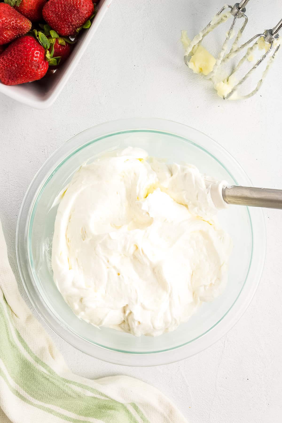 Cool whip being folded into filling mixture