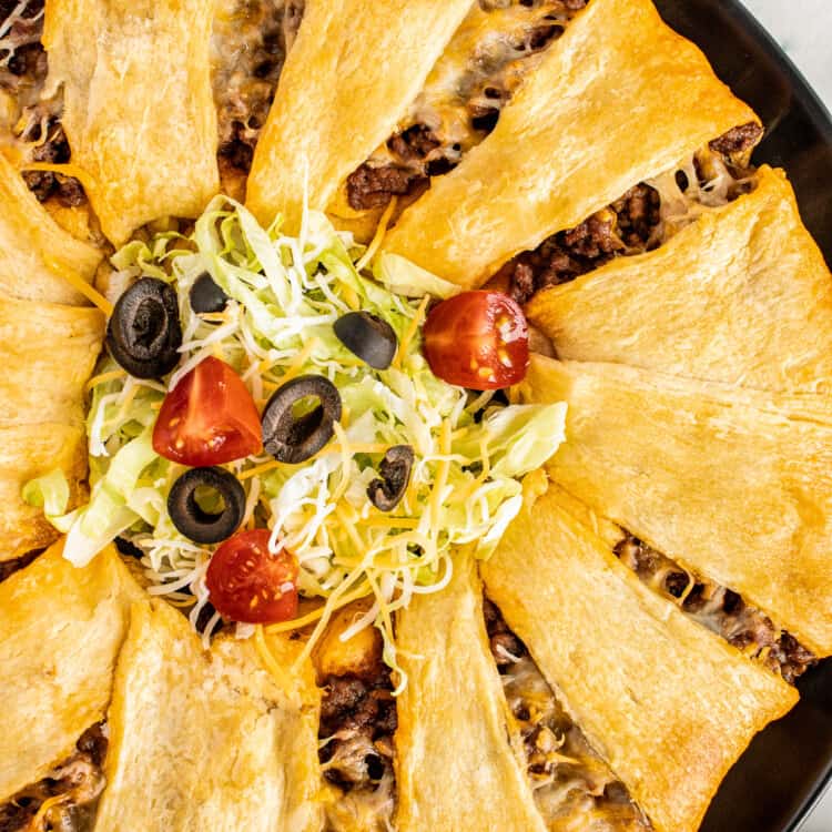 Taco Ring on dark plate with taco toppings in center