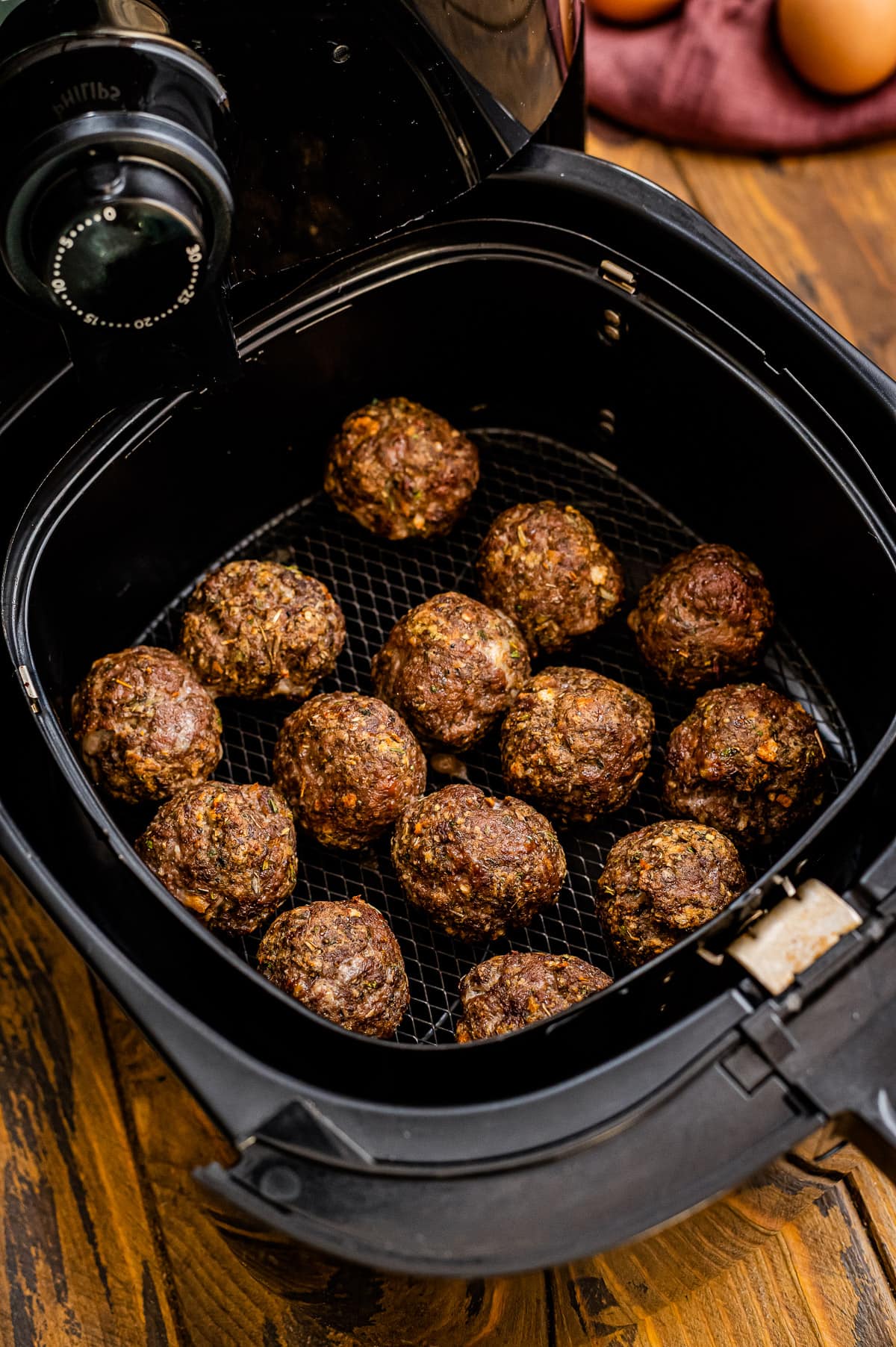 Cooked Air Fryer Meatballs in air fryer basket