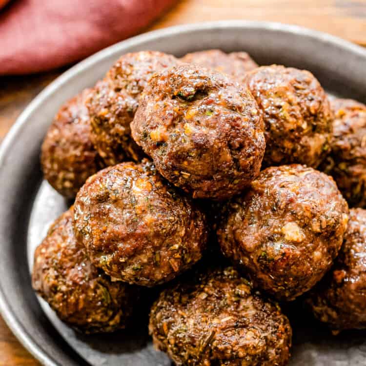 Plate with a stack of meatballs on it