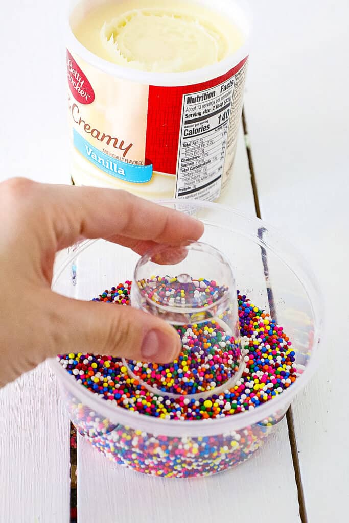 Dipping a shot glass in sprinkles