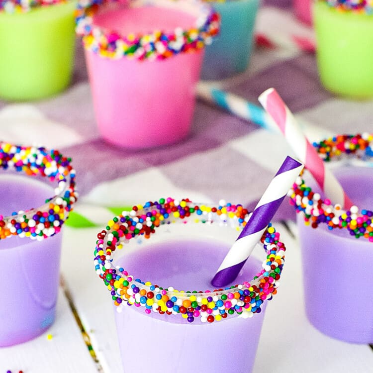 Birthday Cake Shots with mini straws in them