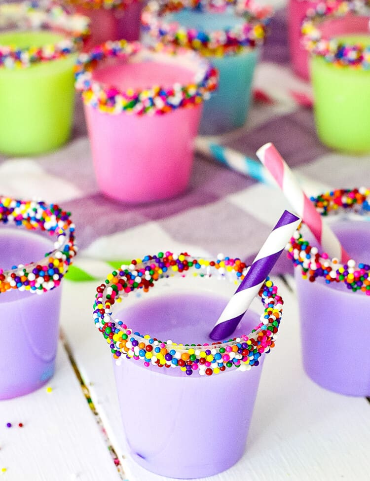 Birthday Cake Shots with mini straws in them