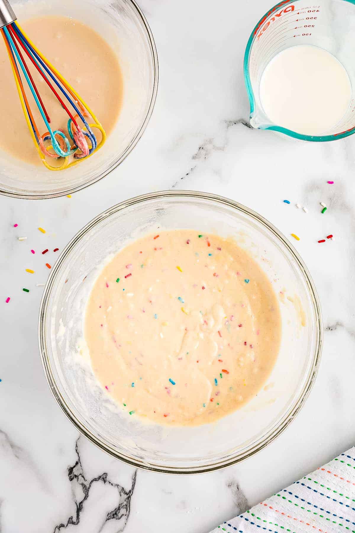 Glass bowl with mixed funfetti pancake batter