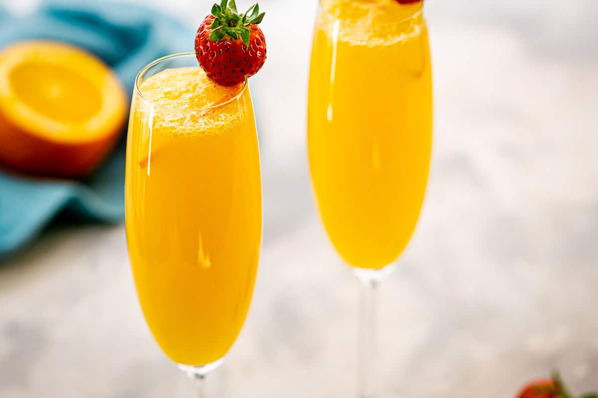 Mimosa Cocktails in champagne glasses