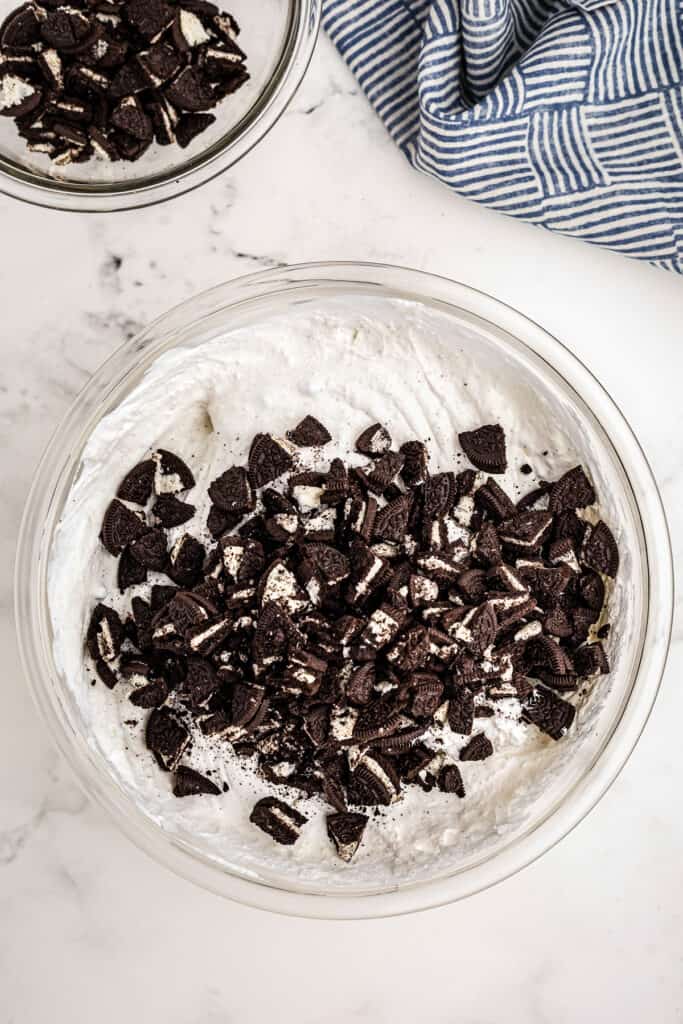 Overhead Image of glass bowl with crushed Oreos on top of pudding