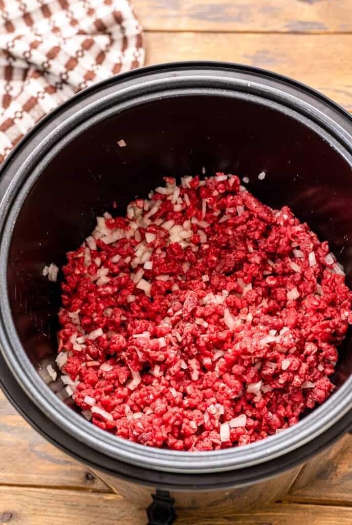 Ground beef in pressure cooker with onions