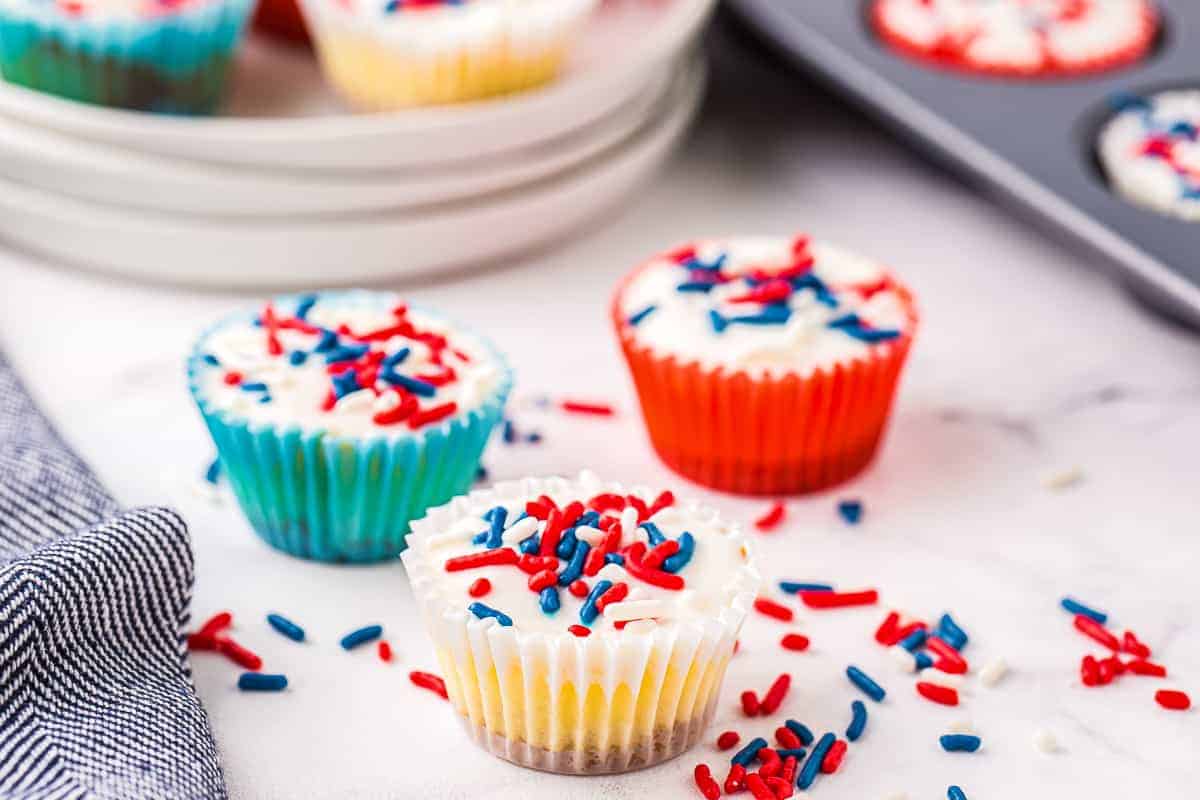 Set of three Red White and Blue Mini Cheesecakes on marble background