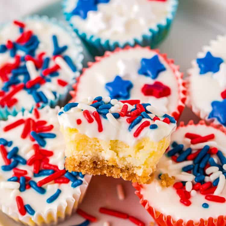 Red White and Blue Mini Cheesecakes stacked on white plate