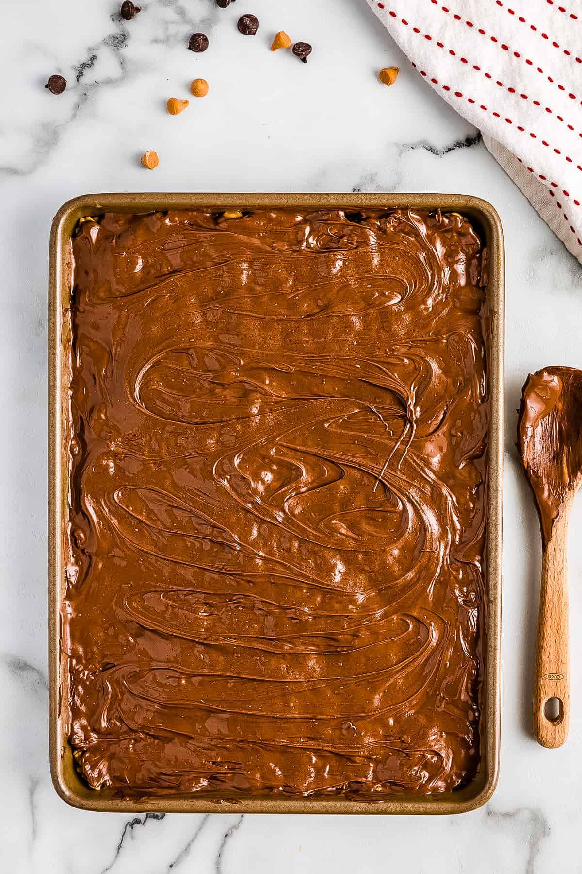 Overhead image of Special K Bars with frosting on top after spreading