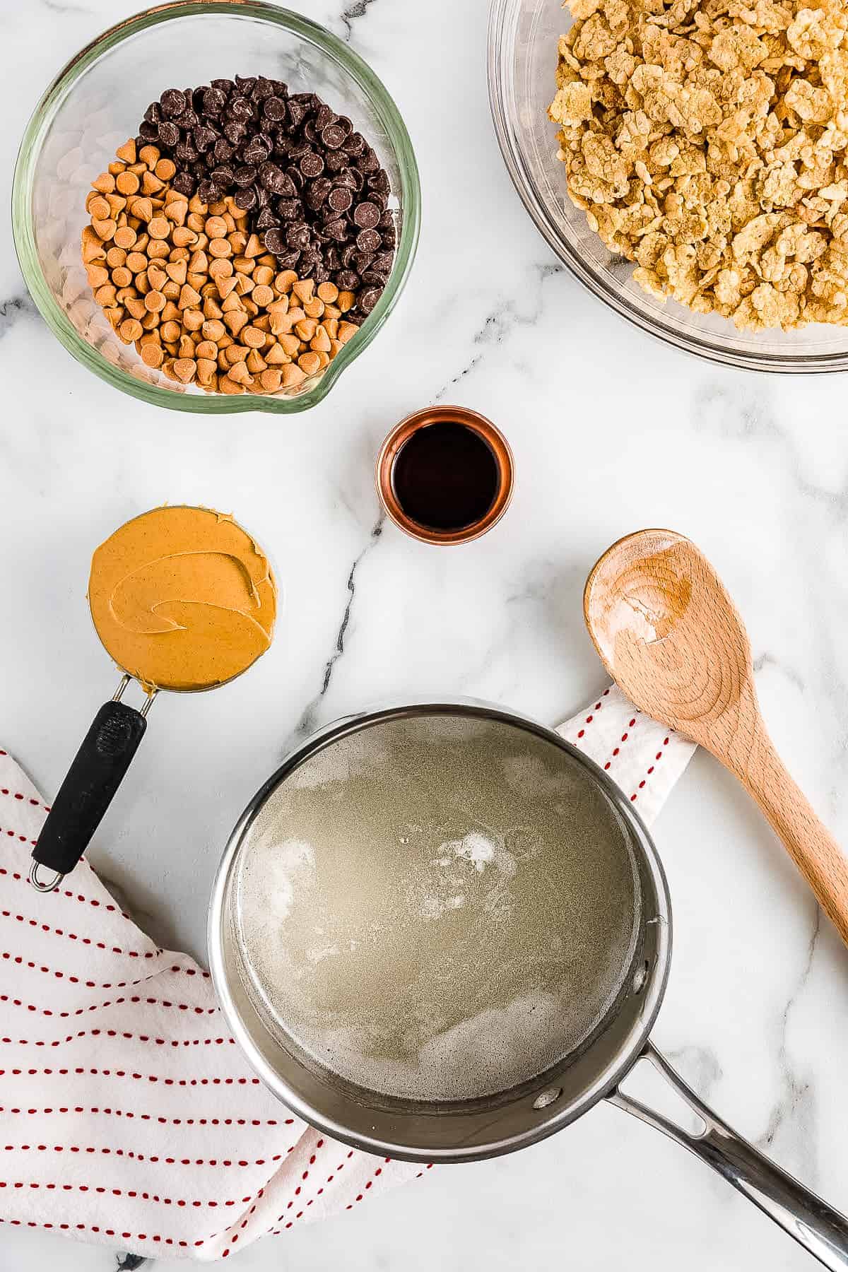 A saucepan with sugar and corn syrup after melting together