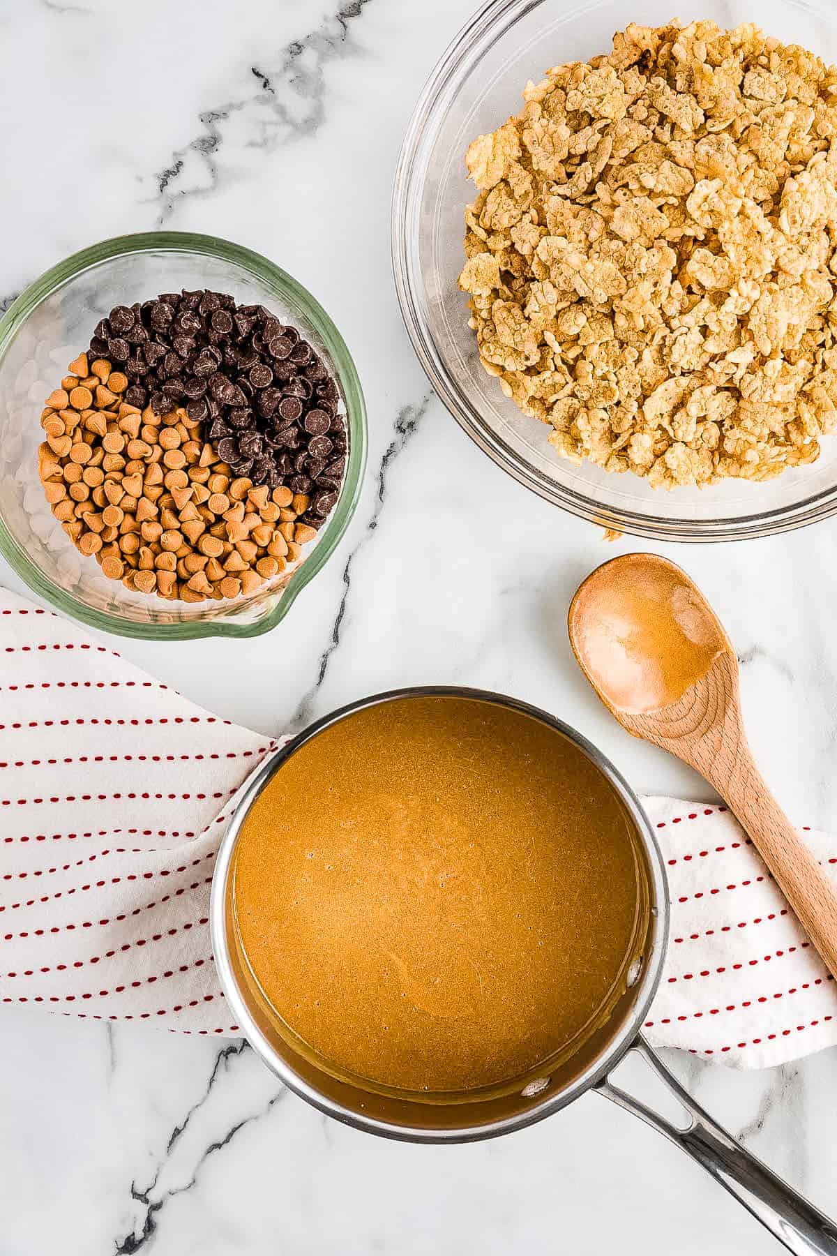 The peanut butter mixture for cereal bars in saucepan