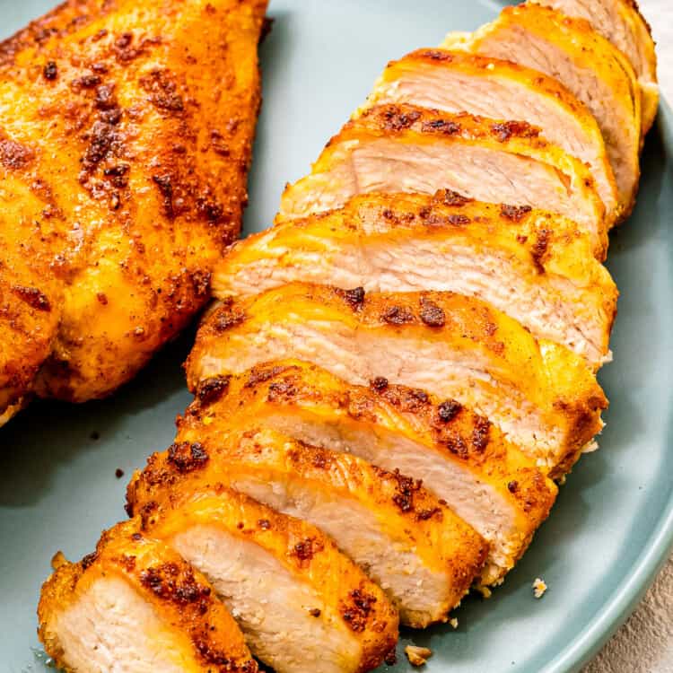 Air Fryer Chicken Breast Sliced on blue plate