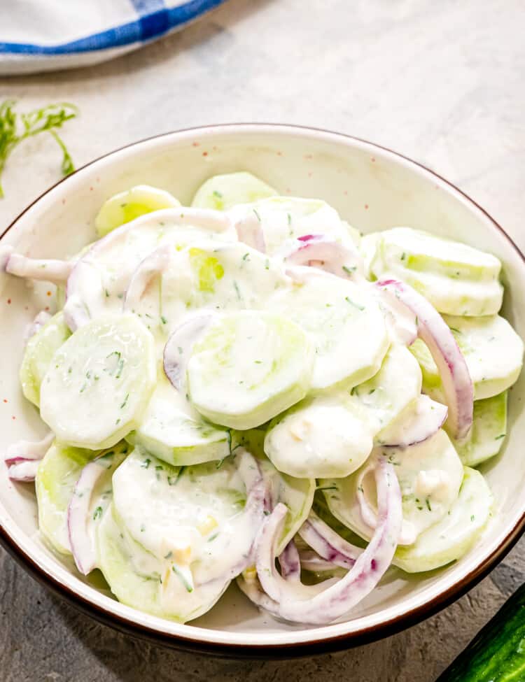 A bowl with homemade creamy cucumber salad