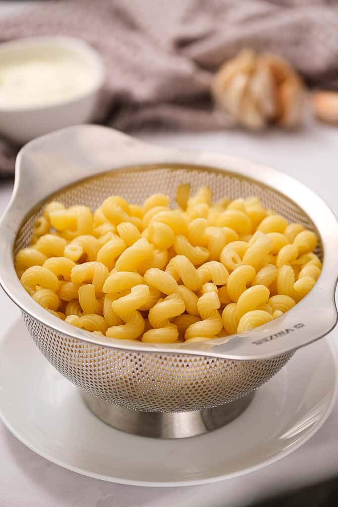 Cavatappi in mesh strainer