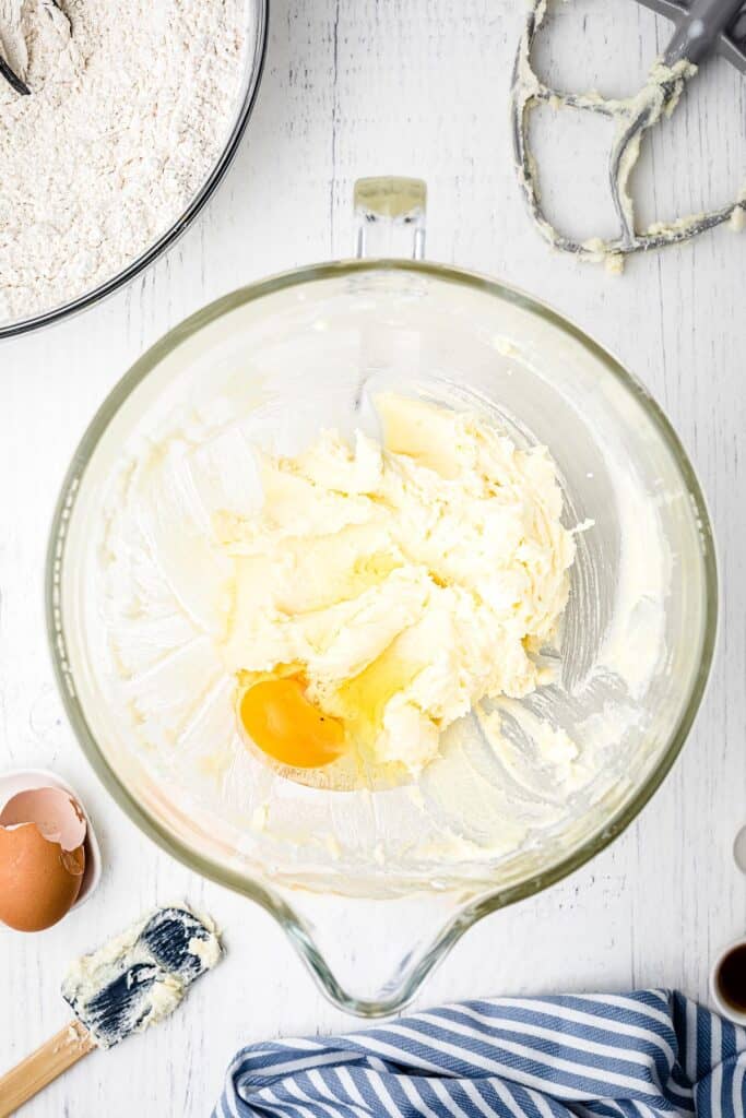 Creaming together cookie ingredients in glass bowl