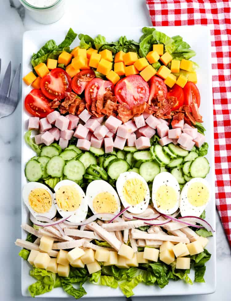 Overhead image of white rectangle platter with Chef Salad