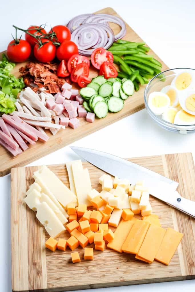 Cutting board with cheese on it