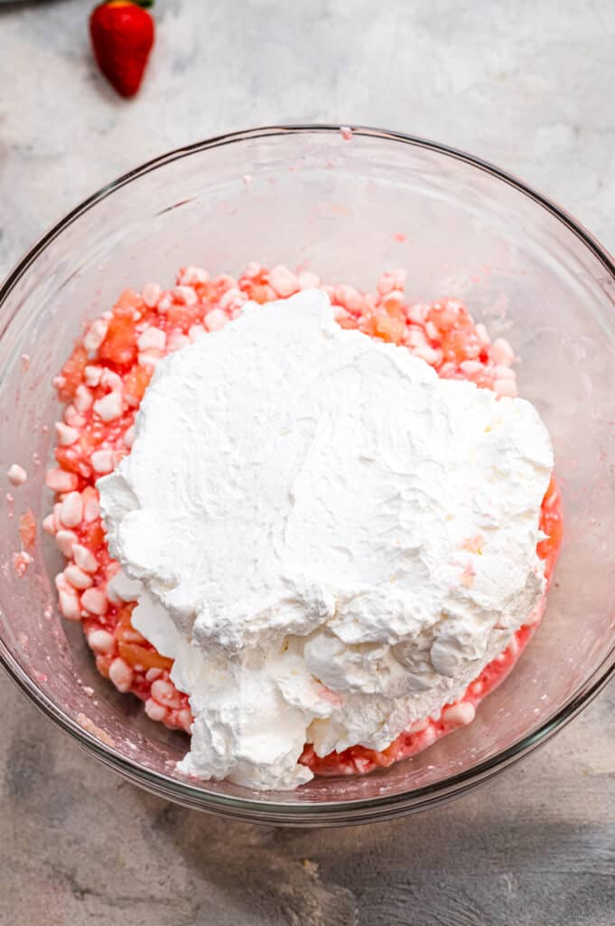 Cottage cheese and jello mixture with Cool Whip on top