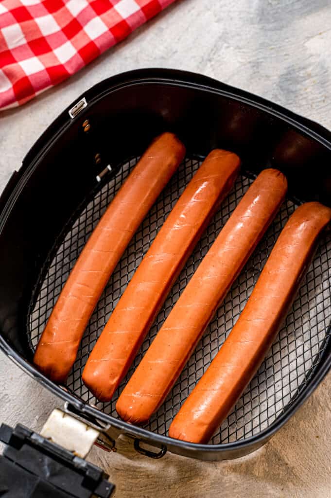 Hot dogs in air fryer baskets