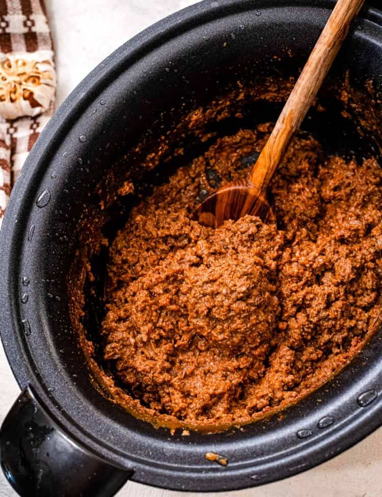 Crock pot with cooked taco meat