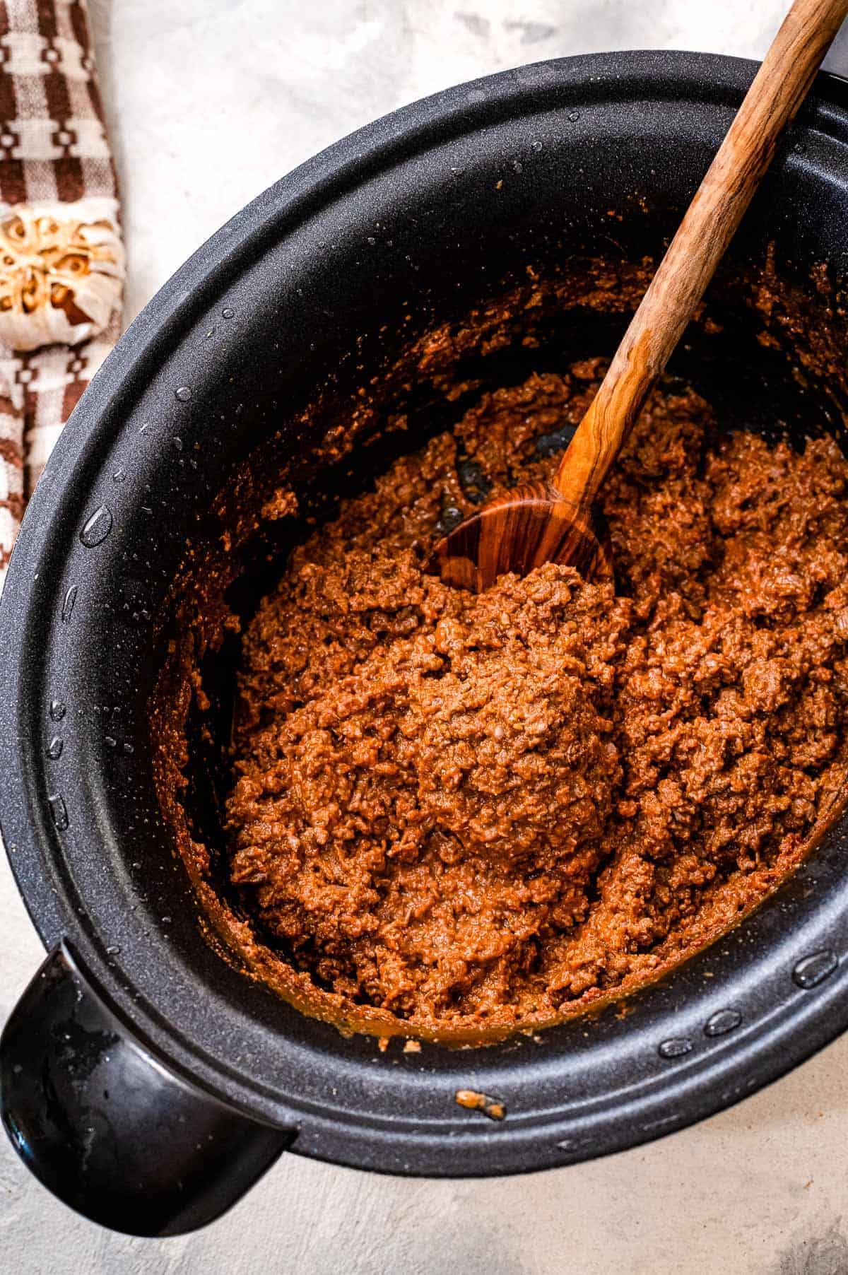 Crock pot with cooked taco meat