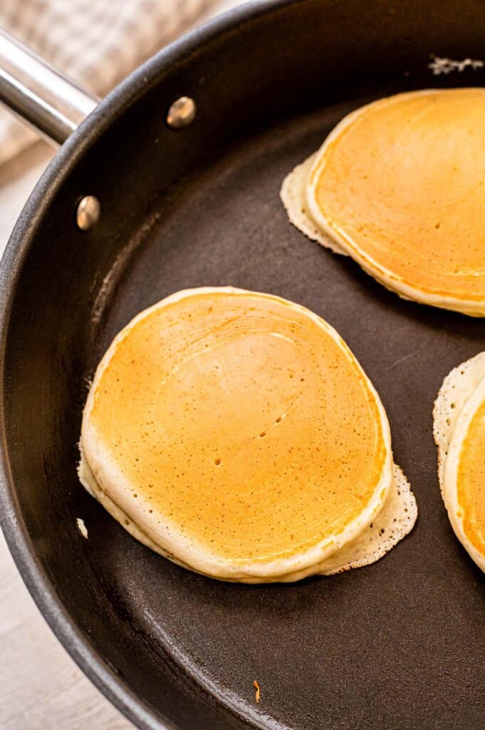 Skillet frying homemade pancakes