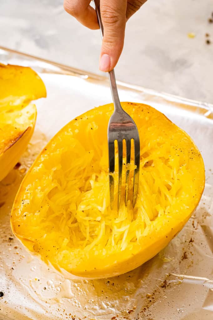 Fork scraping spaghetti squash