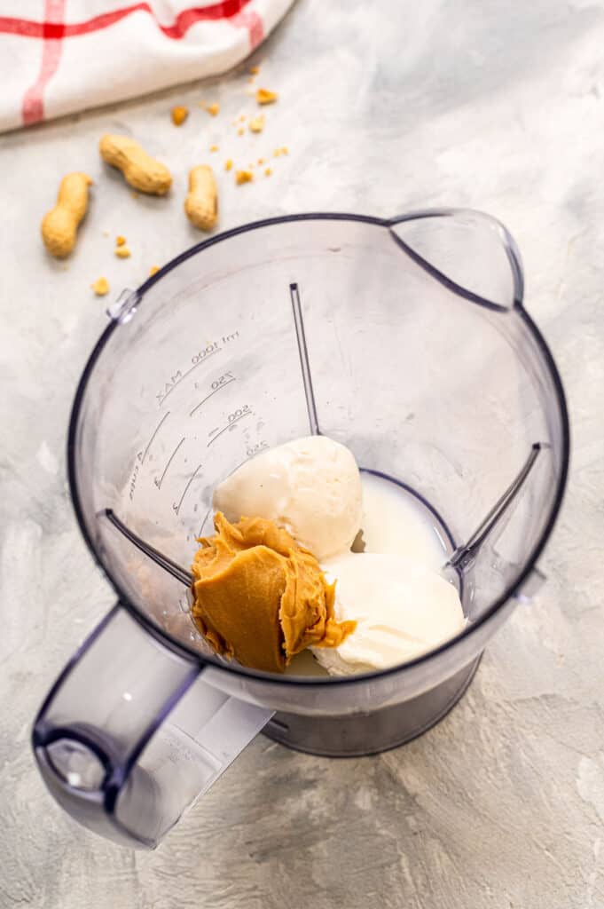 Ingredients in blender to make peanut butter shakes