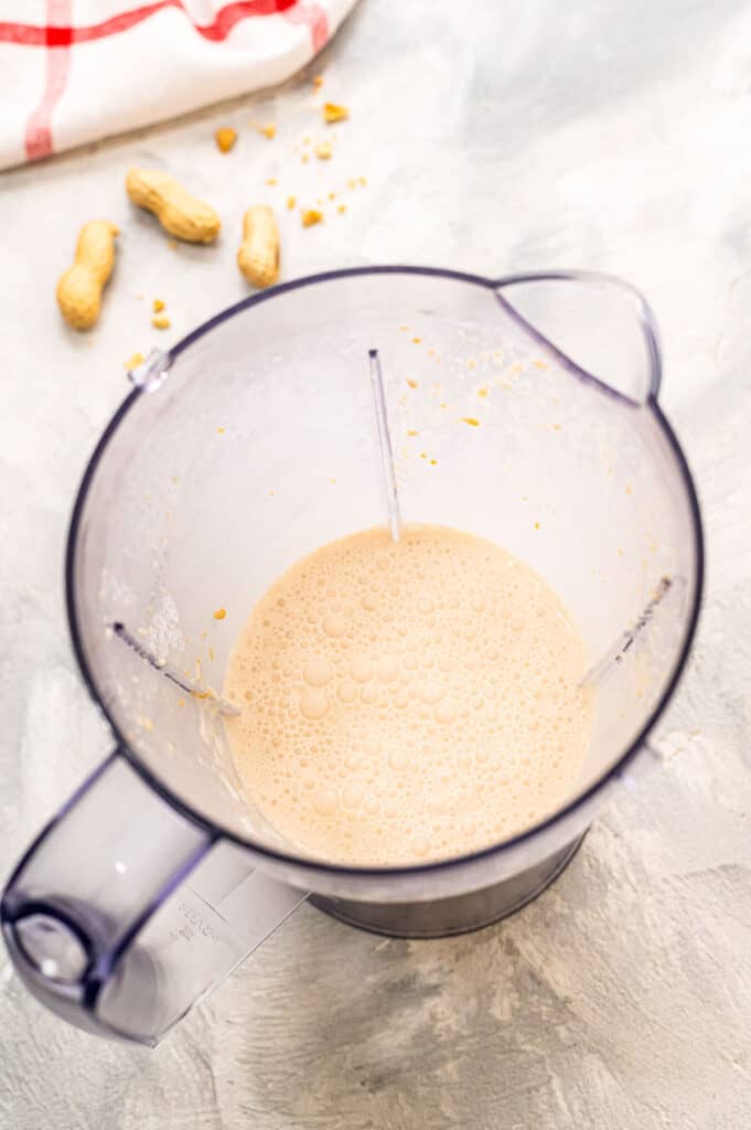 Peanut Butter milkshake blended in blender container