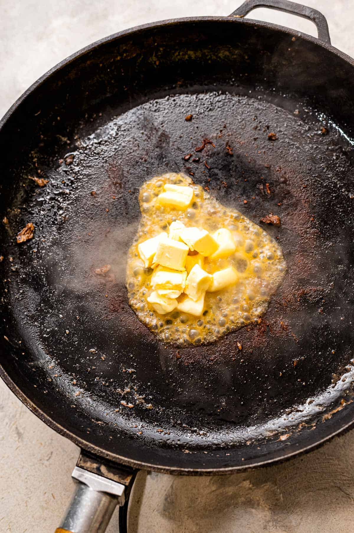 Cast iron pan melting butter