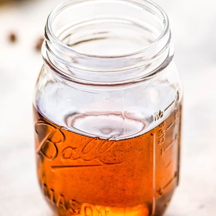 Mason jar with vanilla syrup in it