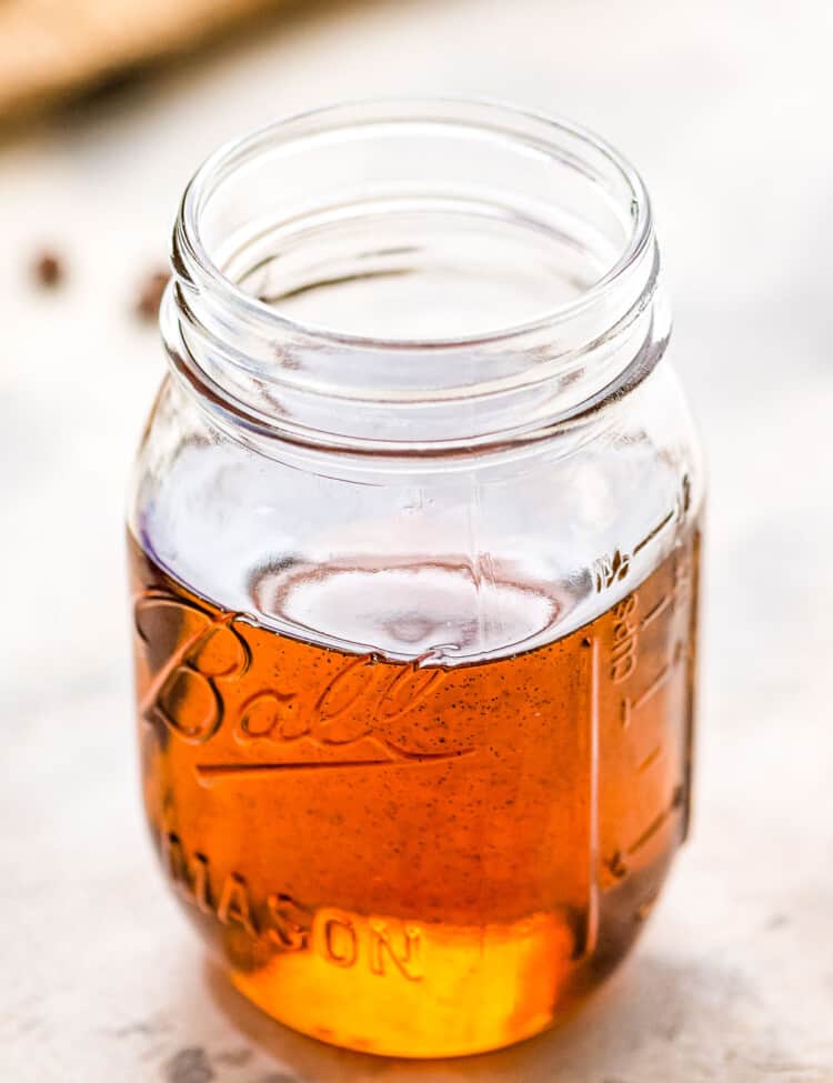Mason jar with vanilla syrup in it
