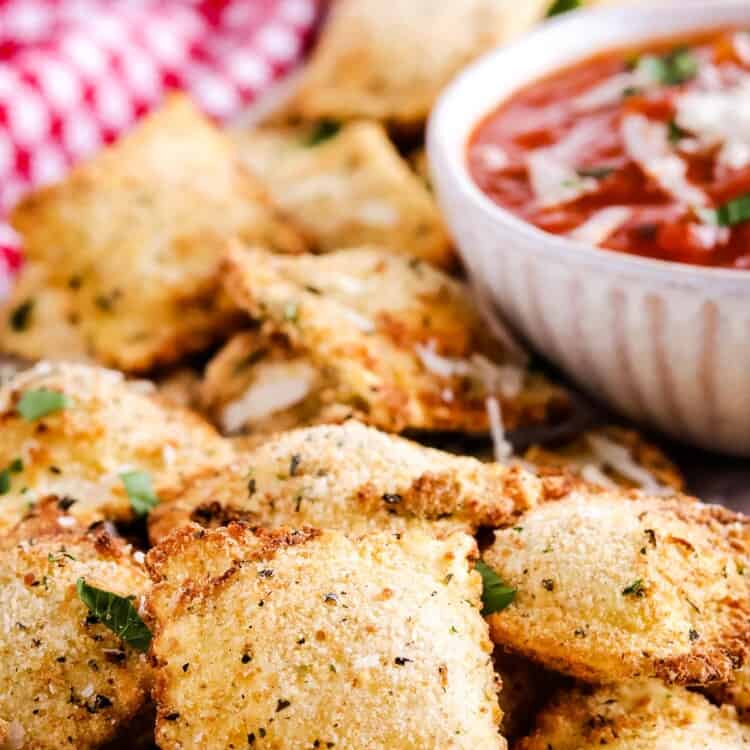 Close up image of Air Fryer Ravioli on wooden board