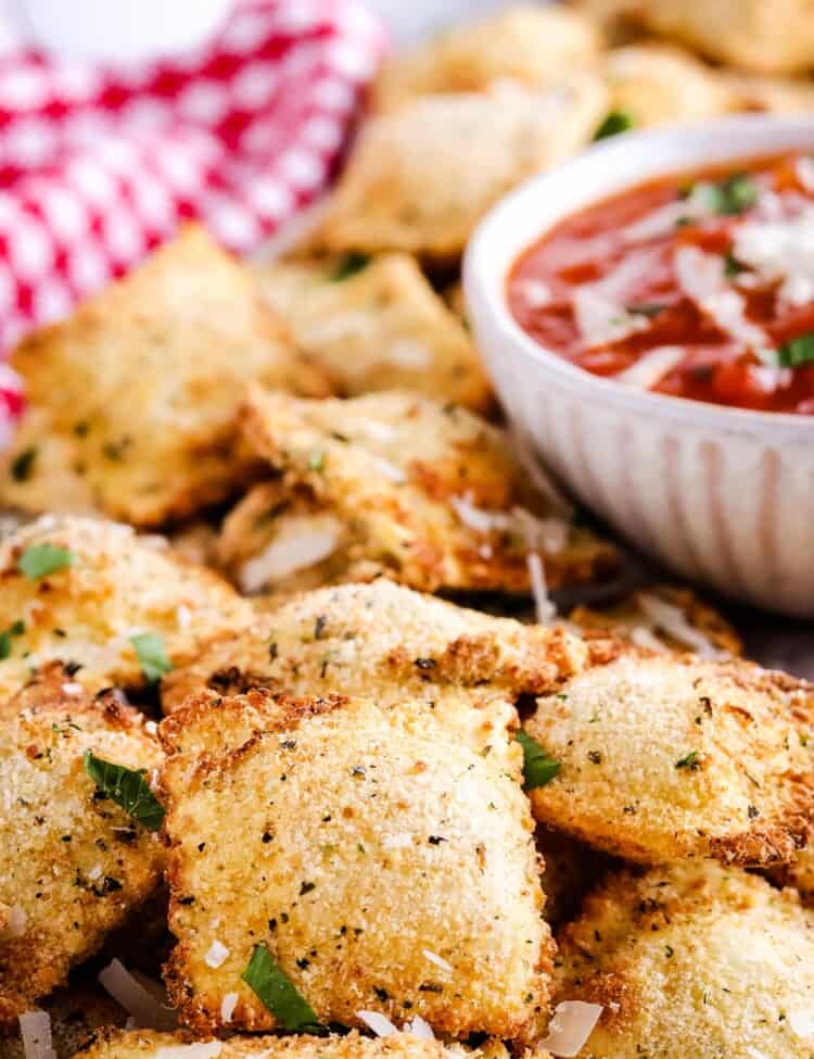 Close up image of Air Fryer Ravioli on wooden board