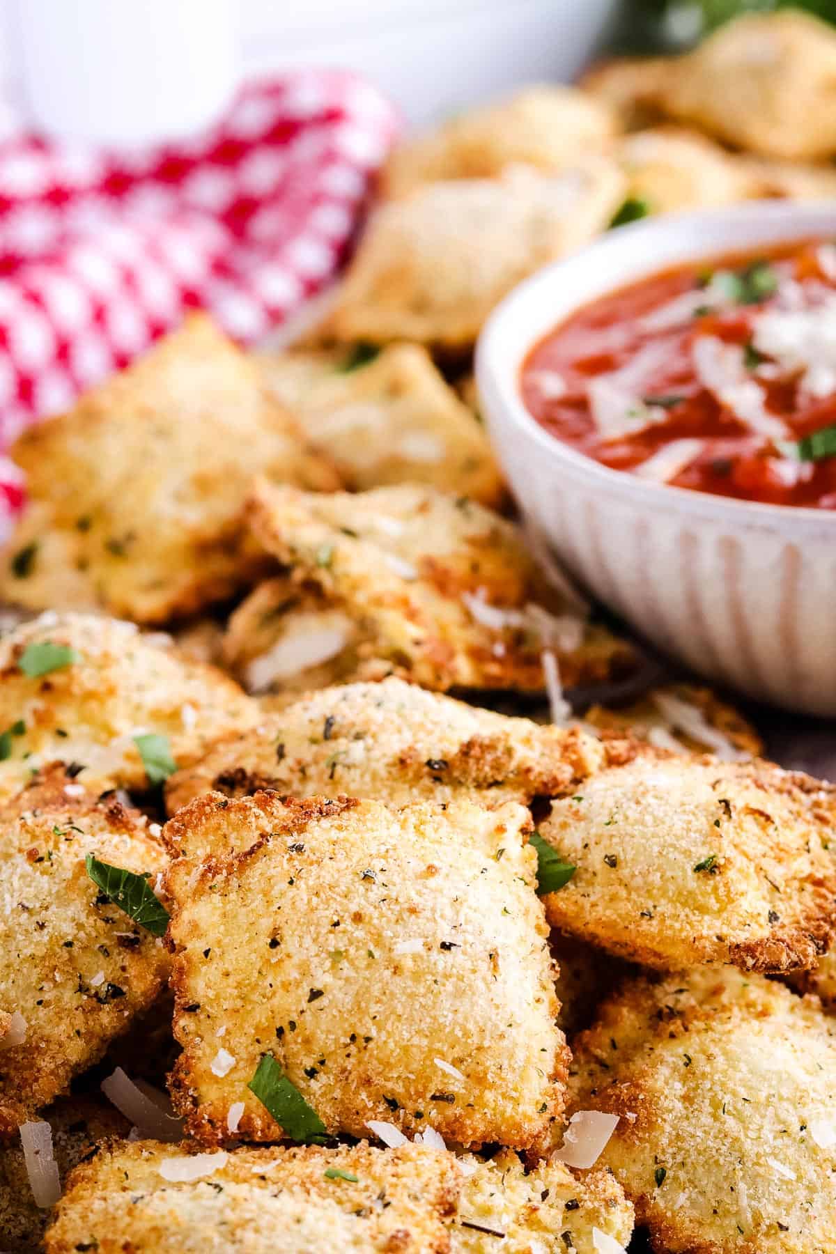 Close up image of Air Fryer Ravioli on wooden board