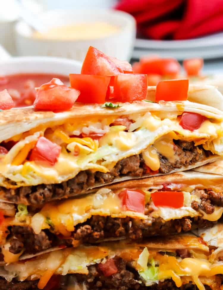 Close up image of Crunchwrap Supreme cut open and stacked