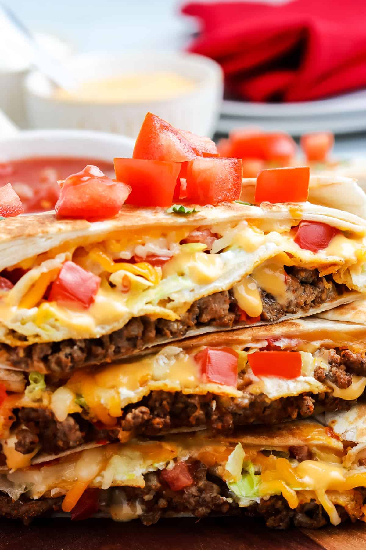 Close up image of Crunchwrap Supreme cut open and stacked