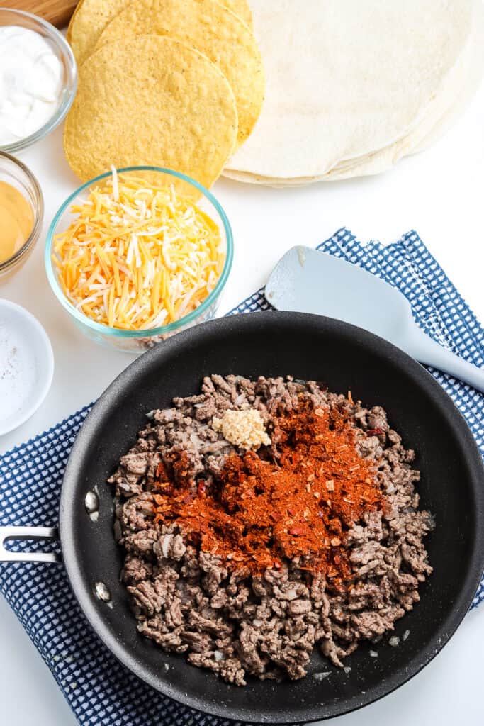 Skillet cooking seasoned taco ground beef