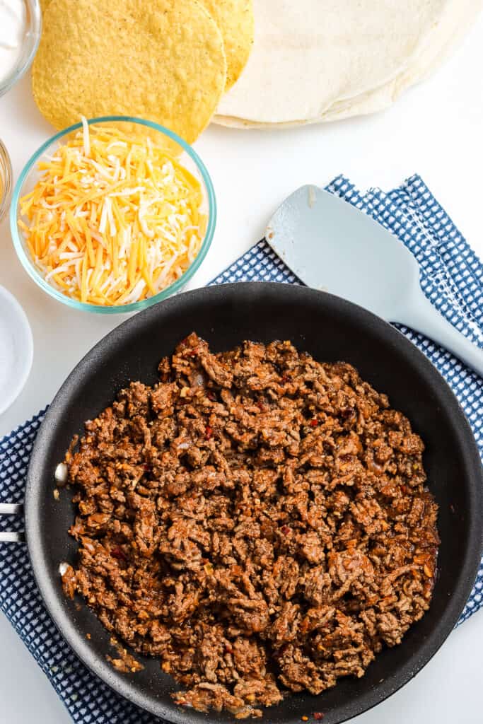 Taco meat in a black skillet