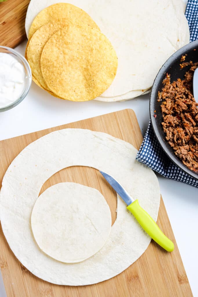 Cutting circle out of the middle of a flour tortilla