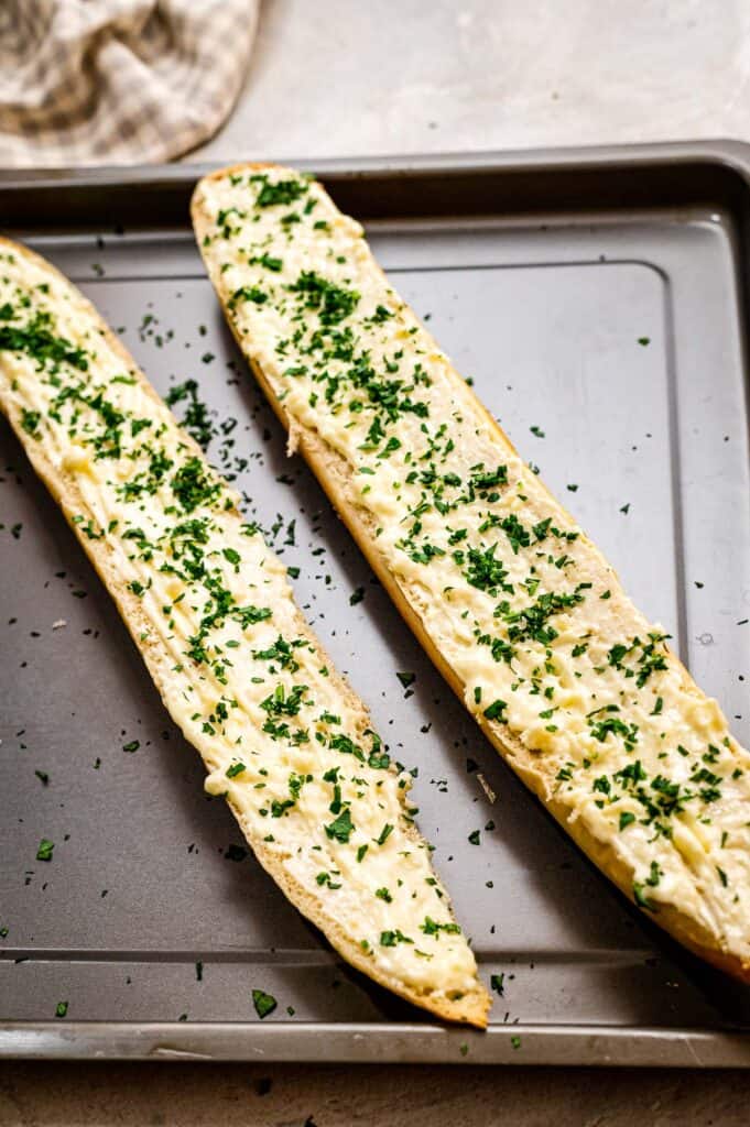 Garlic bread on sheet pan before baking