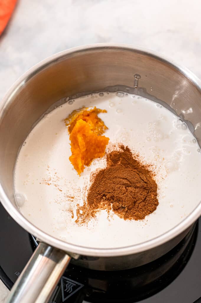 Saucepan with ingredients for pumpkin creamer before stirring