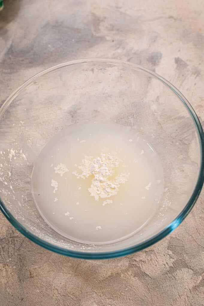 Glass bowl with corn starch and water