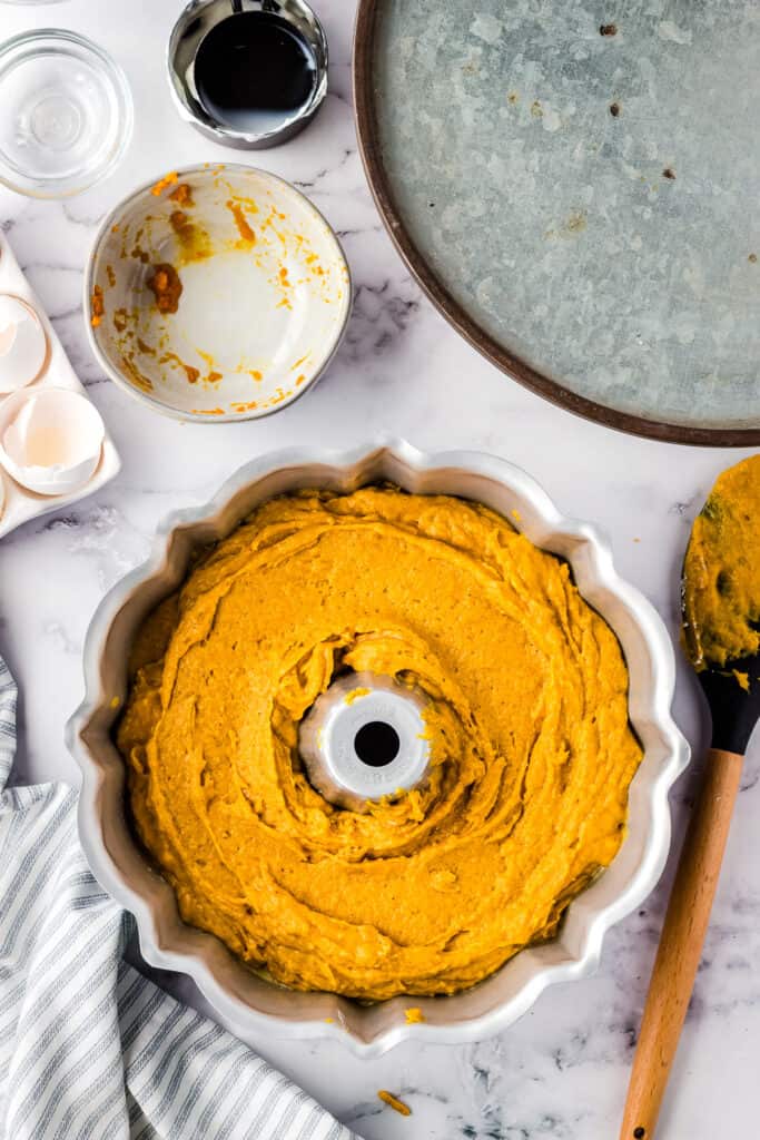 Pumpkin Bundt Cake batter in bundt pan