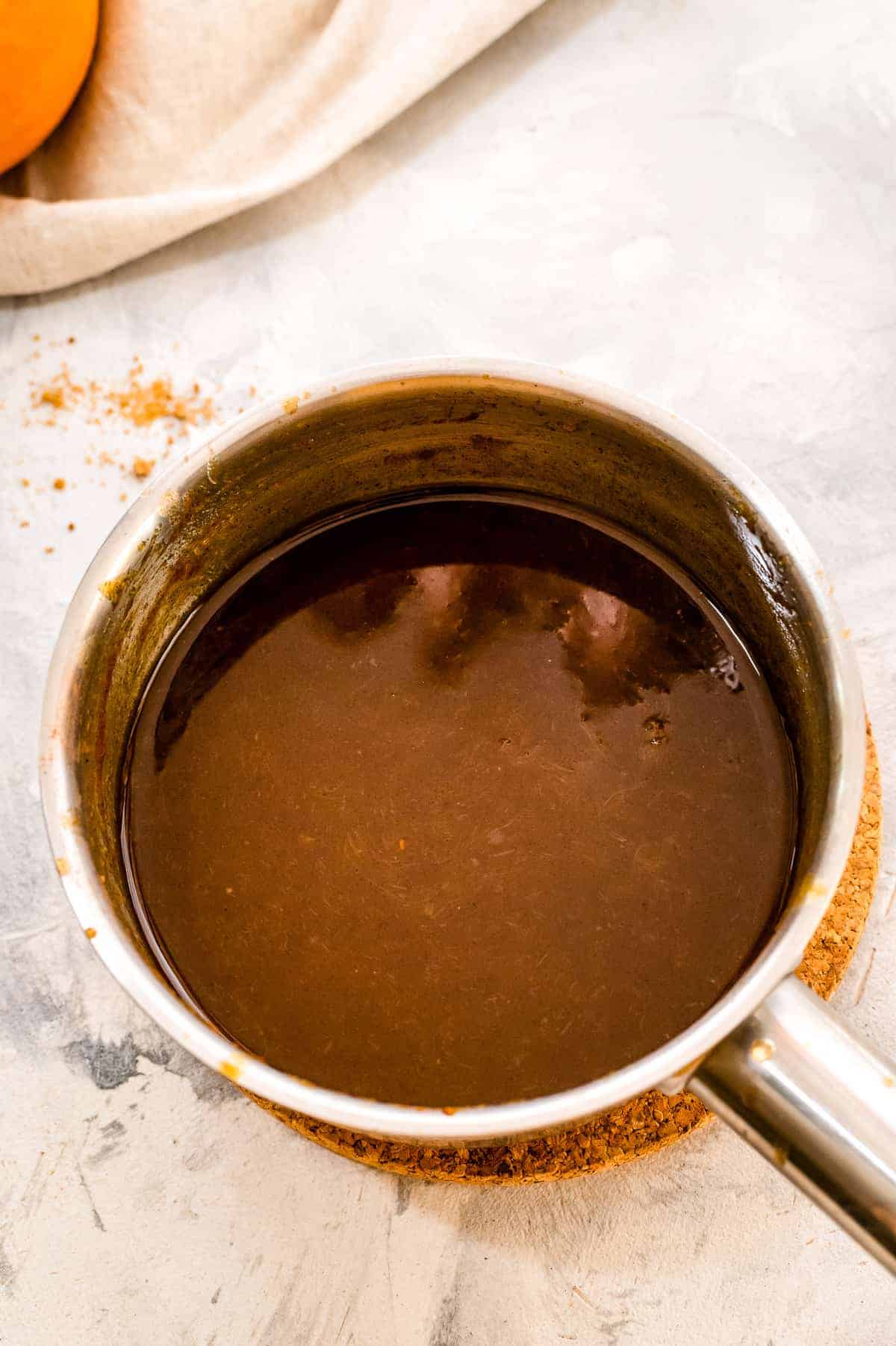 Pumpkin syrup in saucepan