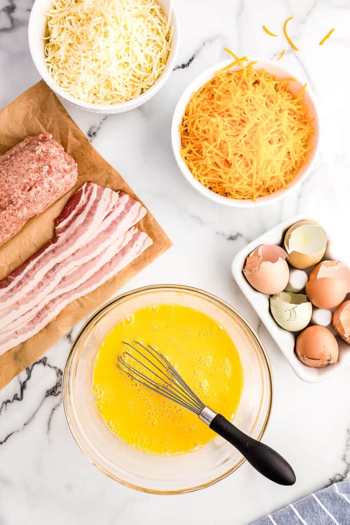 Overhead image of glass bowl with whisked eggs