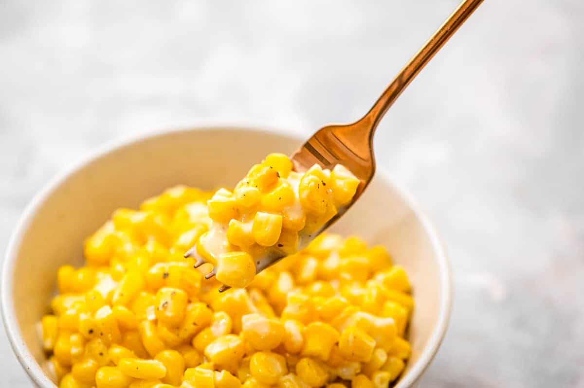 Fork with creamed corn on it