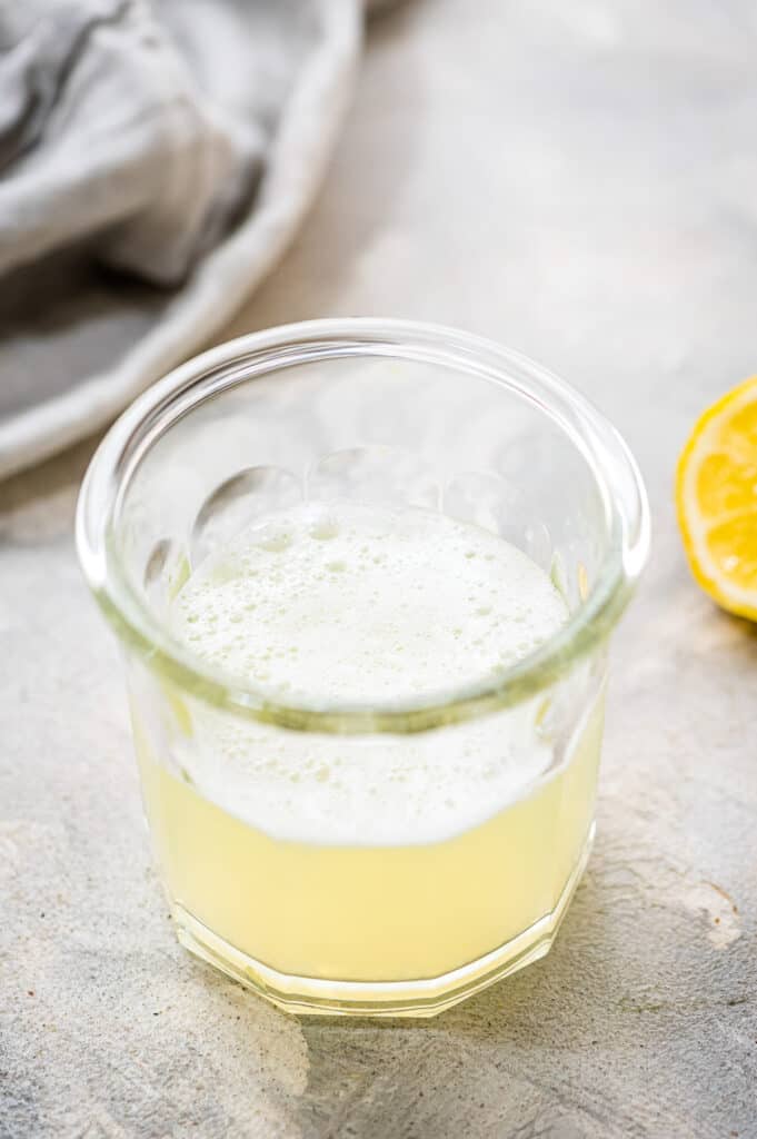 Foamy gin fizz in cocktail glass