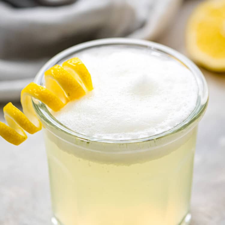 Classic Gin Fizz in cocktail glass with foamy top